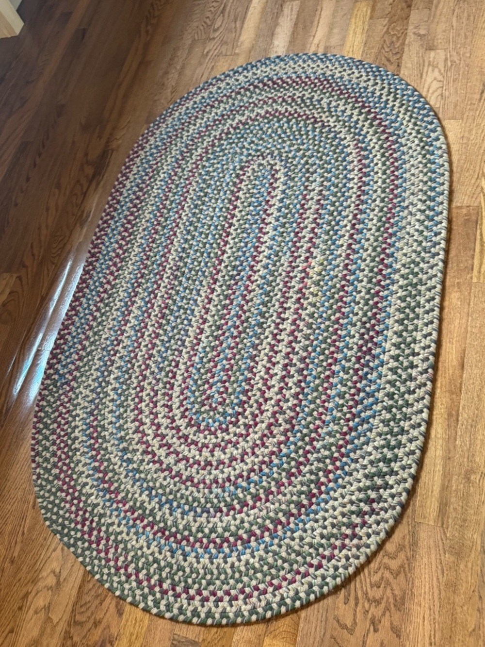 Oval Braided Area Rug in Cream, Blue, Green & Berry